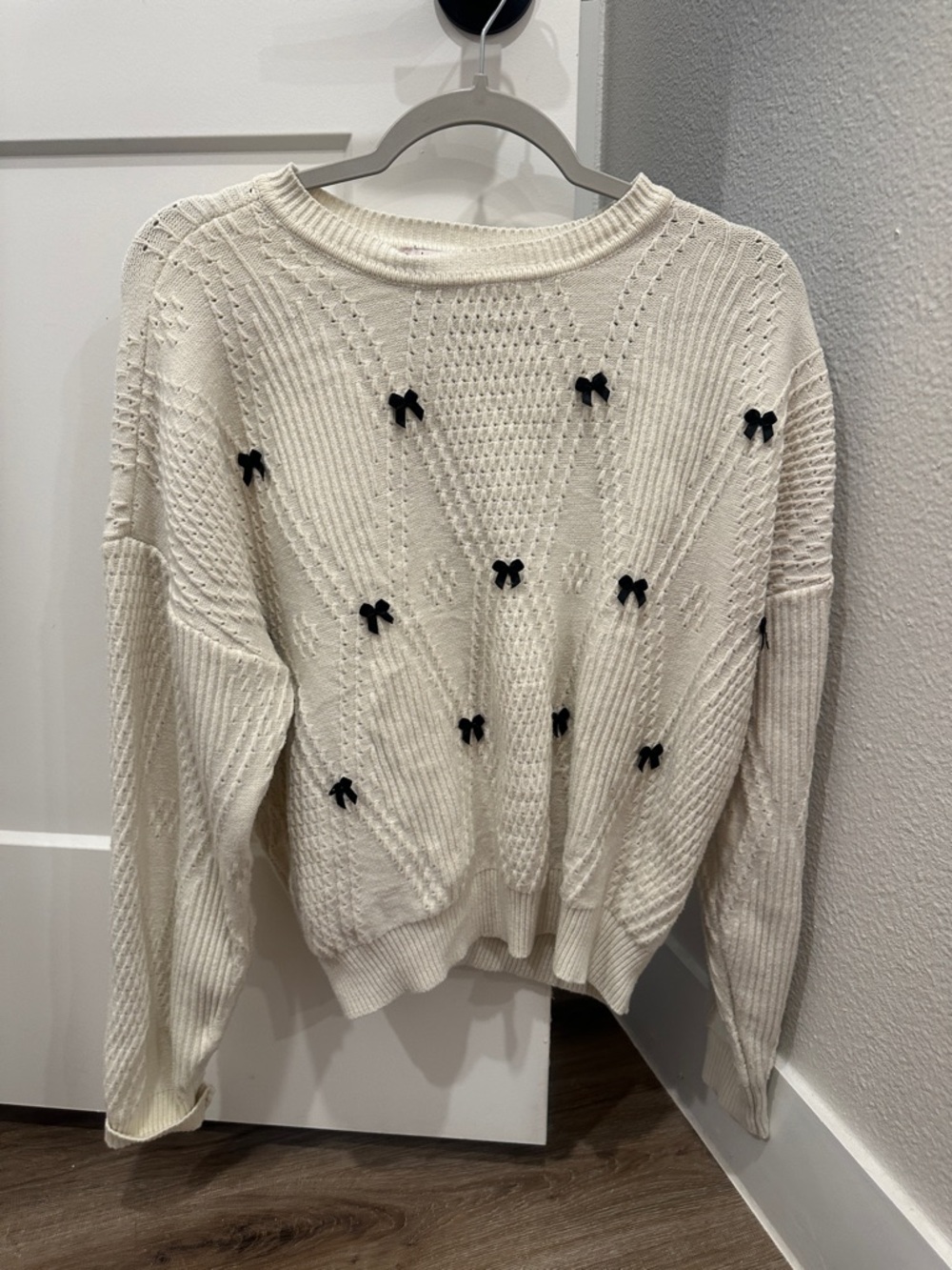 Nanette Lepore Cream Knit Crewneck Sweater with Black Bow Details